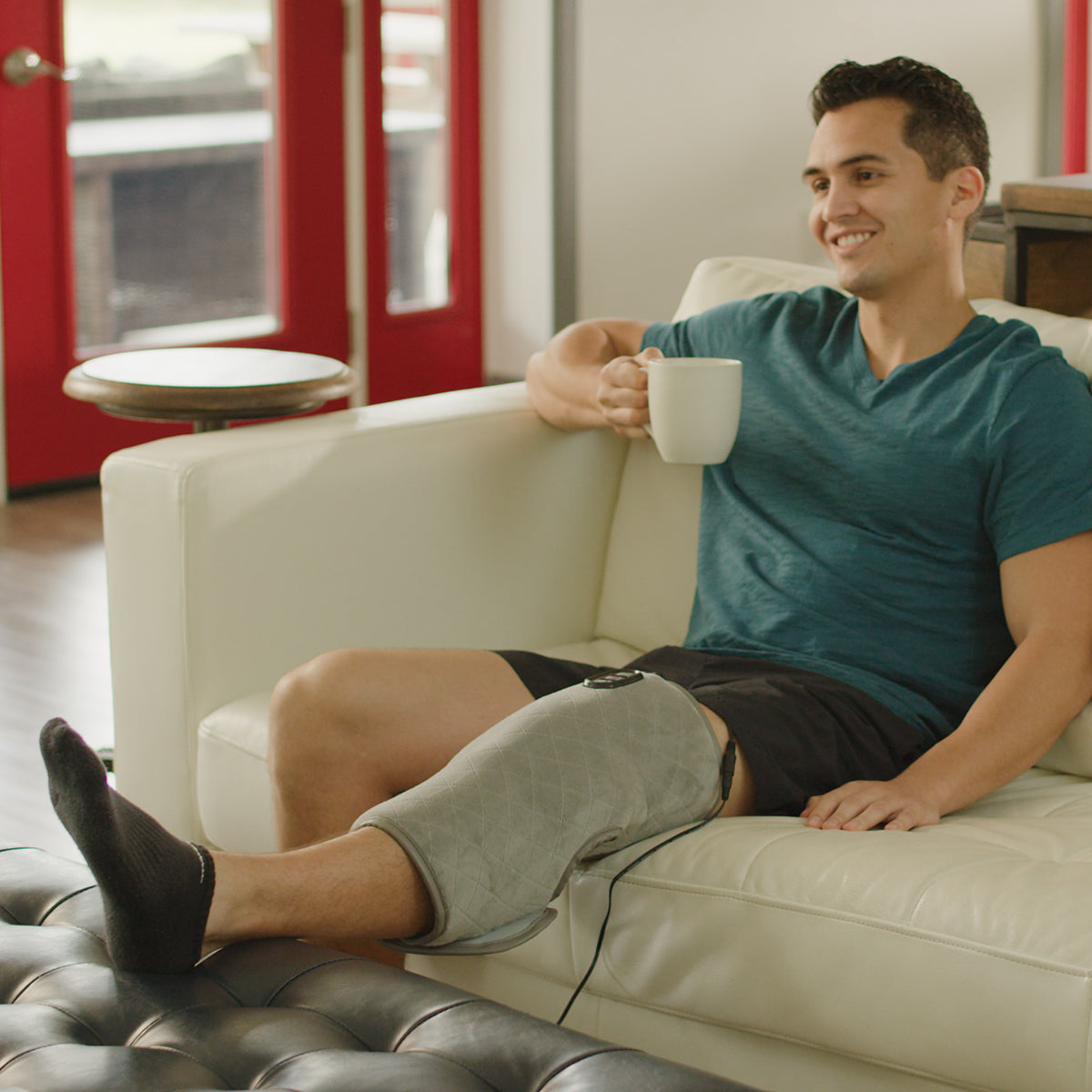 Calming Heat™ Charcoal + Copper Infused Massaging Knee Wrap by Sharper Image