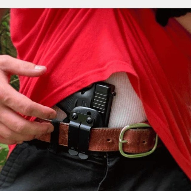 Holster concealed under a T-shirt